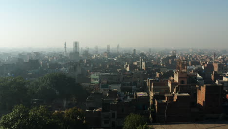 historic townscape of lahore's city center against overcast sky in punjab, pakistan