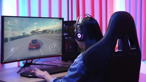 girl in headphones plays a video game and win