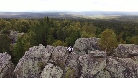 person on a rocky mountain ridge