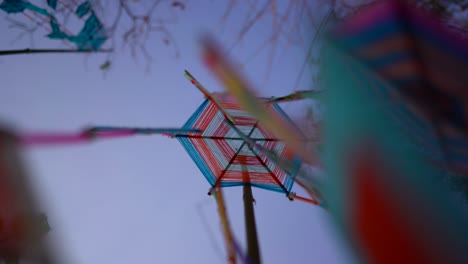 tung on blue sky background, it is a term for yarn work that is wrapped in three pieces of bamboo cores. use different colored yarns to add beauty