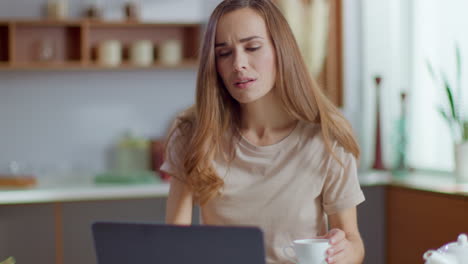 Businesswoman-working-on-laptop-computer-at-home