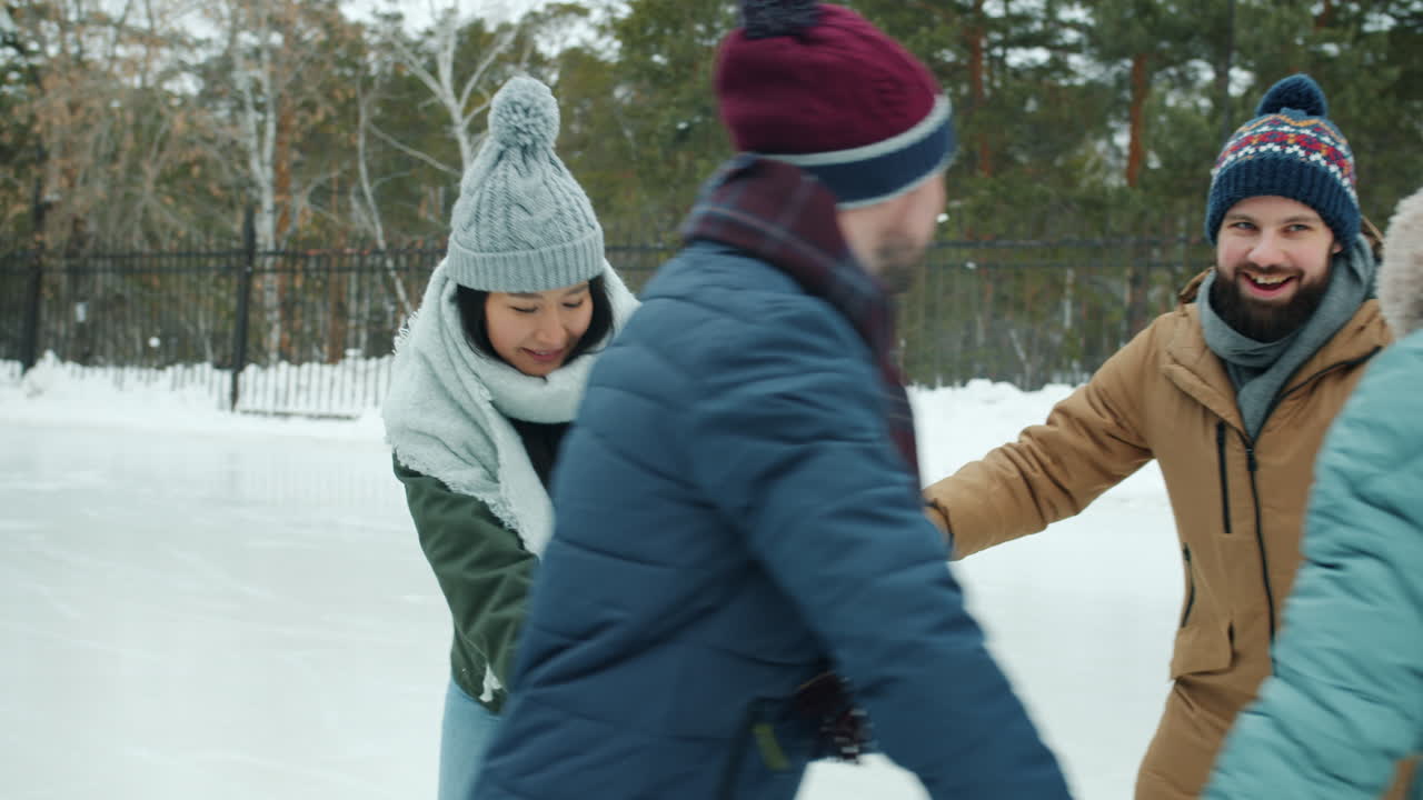 Friends Ice Skating in Winter