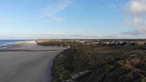 Aerial-view-of-the-North-Sea-shoreline-outside-Løkken,-Denmark