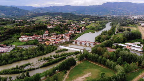 Beautiful-aerial-shot-of-river-Serchio-in-Lucca,-Italy,-4k