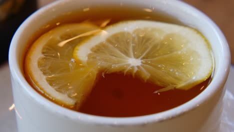 lemon tea in a white cup