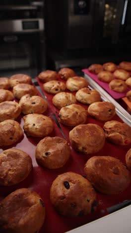 baked goods on baking trays in a commercial kitchen