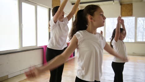 Teacher-and-pupils-in-dance-class