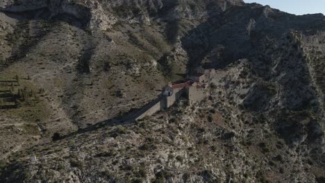 Orbiting-aerial-of-medieval-Hermitage-Notre-Dame-de-Pene-chapel