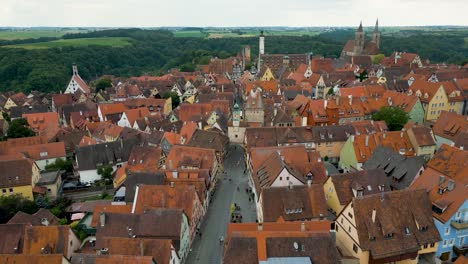 4k aerial drone video of historic homes, towers and churches in the walled city of rothenburg ob der tauber, germany