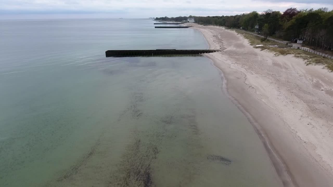 Aerial Shot of Ystad Saltsjöbad on a Cloudy Day in South Sweden Skåne With Piers and Trees By The Beach Near Östersjön