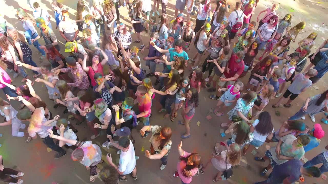 People During Holi Festival Celebrations. VINNITSA, UKRAINE - JULY 2017: People throwing colorful paint and powder during holi festival celebrations