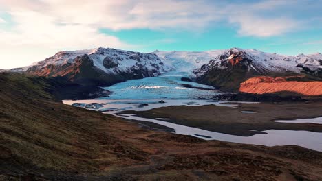 beautiful scenery in kviarjokull glacier outlet in south iceland - aerial shot