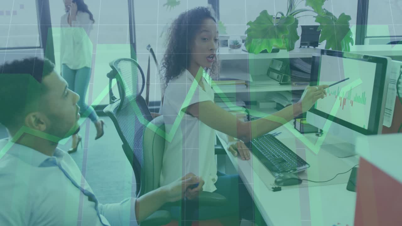 Seated woman pointing chart and causing green grids and arrows, man listening and talking finance