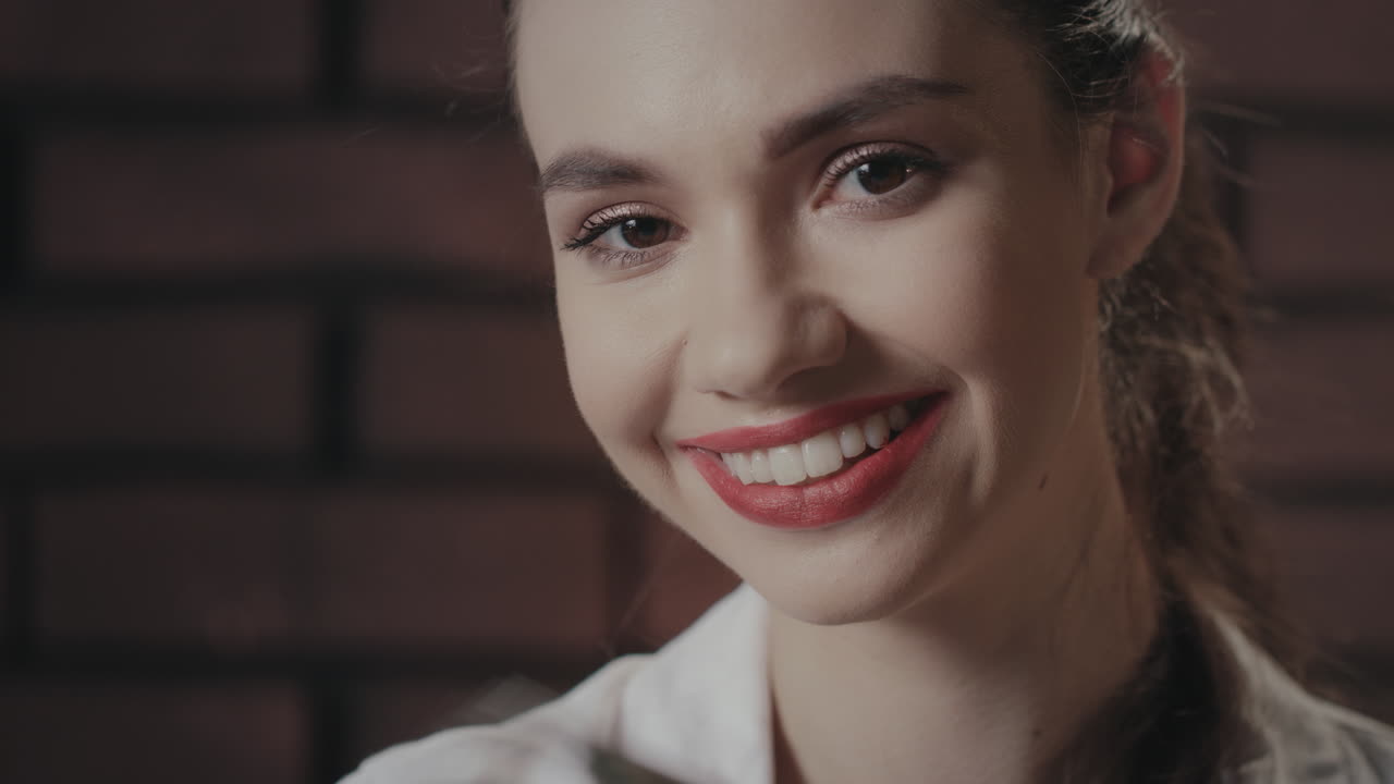 Happy woman holding money in hands