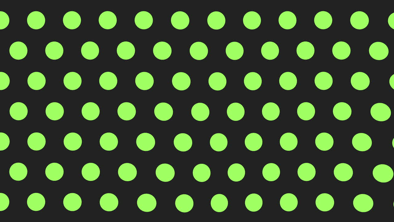 Pattern of green and black dots on black background