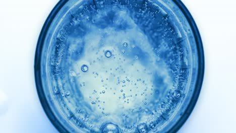 oxygen bubbles in water on a blue abstract background