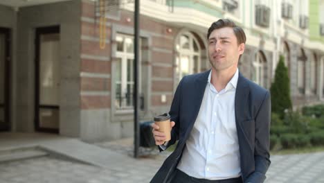 closeup businessman going to work with coffee . man going to job with drink