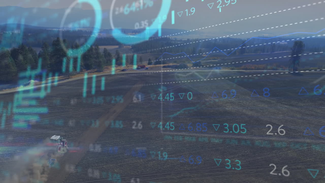 Traktori kyntää laajaa viljelysmaata näyttäen samalla reaaliaikaisia digitaalisia kaavioita maaseutumaiseman päällä.