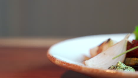 Gourmet octopus plate slider shoot close up panning