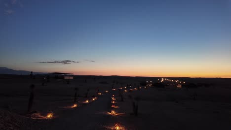 Light-up-patch-desert-of-Agafay,-Morocco,-North-Africa-arid-land-after-sunset