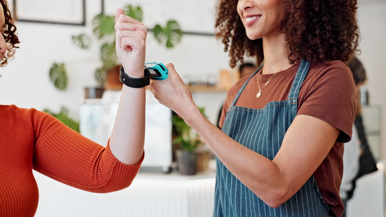 Customer paying with a mobile payment at a coffee shop