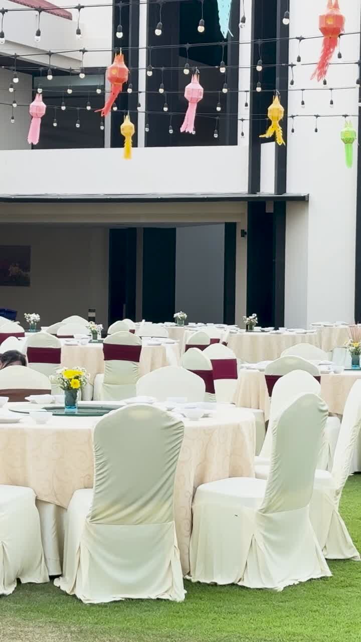 Tables arranged for an outdoor event gathering