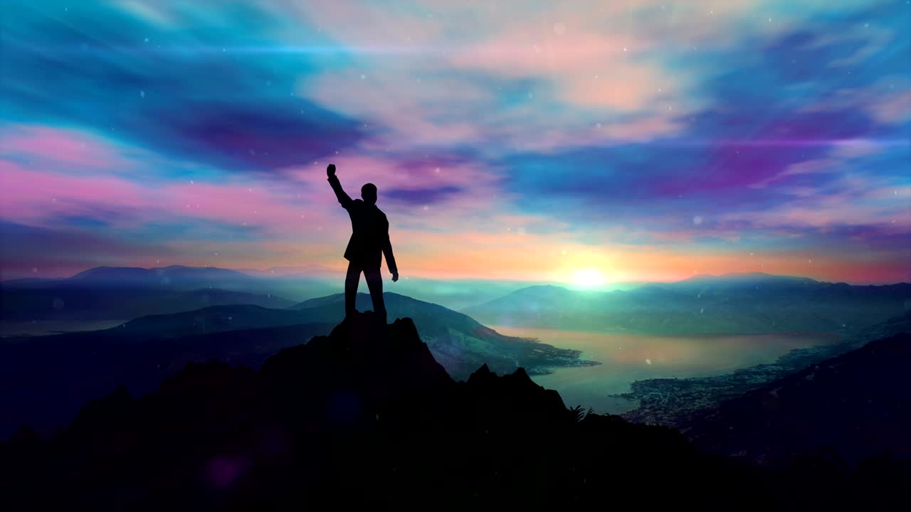 silueta de un exitoso hombre de negocios en la cima de una montaña