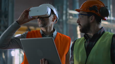 engineers using vr in a factory setting