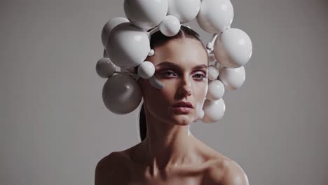 woman with futuristic headpiece