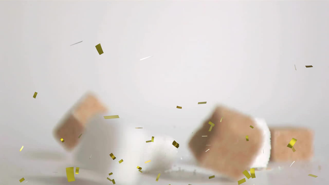 cubos de azúcar que caen, malvaviscos y confeti dorado en el fondo animado