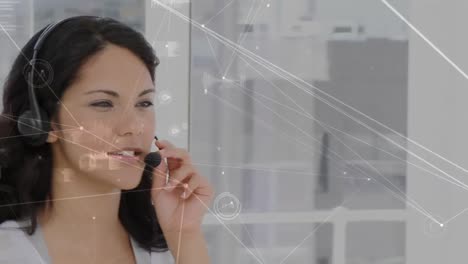 Animation-of-network-of-connections-over-businesswoman-using-phone-headset