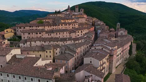 flying towards the buildings in the town of nocerna umbra in italy