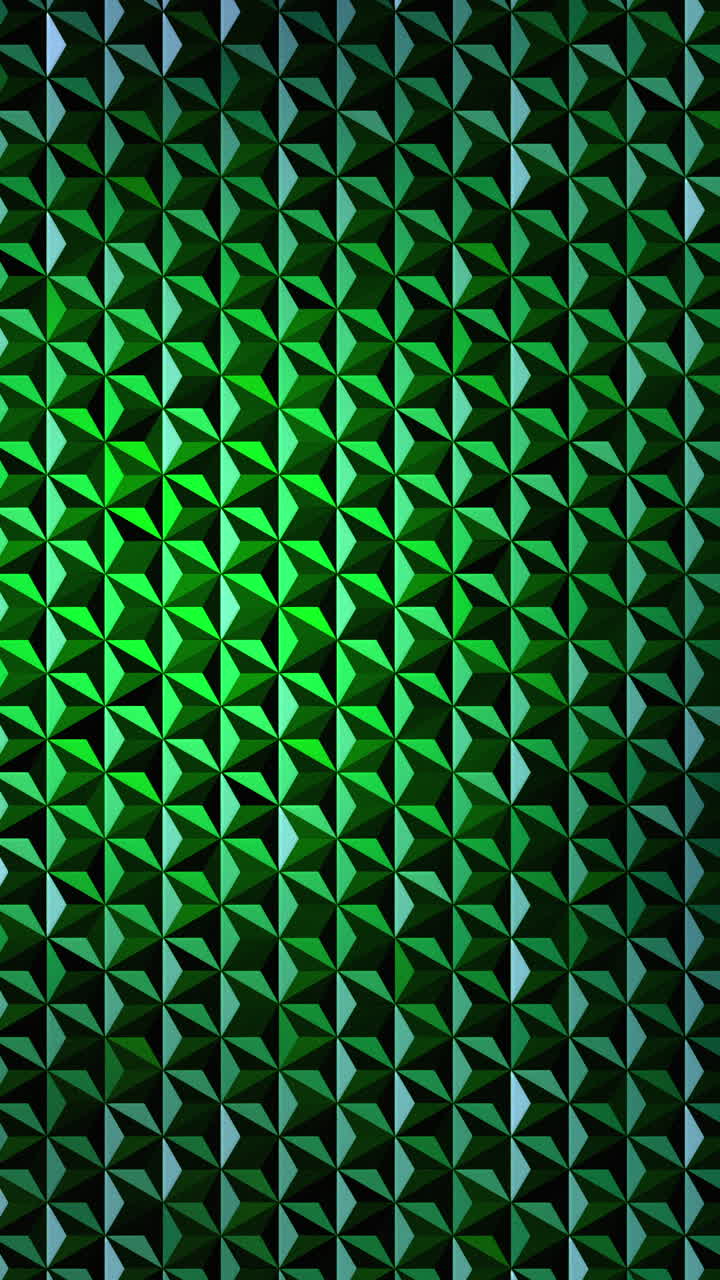 Green and black 3D triangular mosaic with gradient shading and texture. Geometric prism pattern background. Loop animation. Vertical video