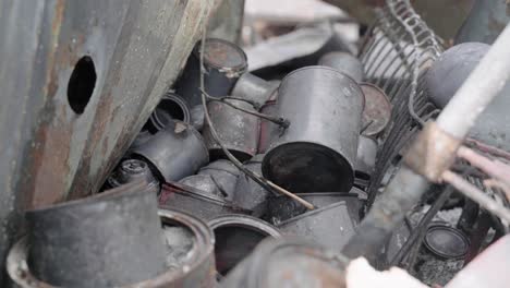 Pile-of-Burnt-Soup-Cans-are-some-of-the-Only-Remains-in-Motor-Home-Park-from-Oregon-Wildfires