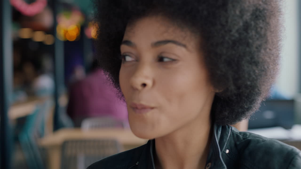 young african american woman eating seafood at restaurant with best friend using smartphone taking photo girl friends having fun sharing weekend together on social media 4k