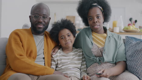 happy family watching tv