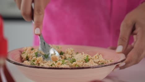 Mixing-ingredients-to-make-fresh-crab-cakes