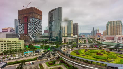 china famosa luz de día de macao tráfico calle construcción de hoteles panorama 4k lapso de tiempo