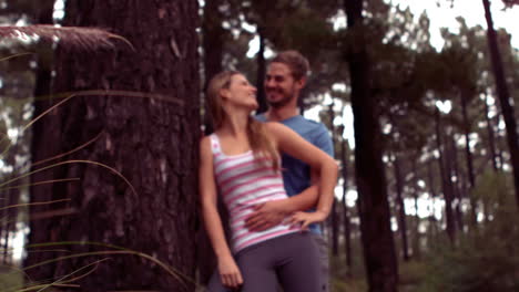 couple hiking through a forest