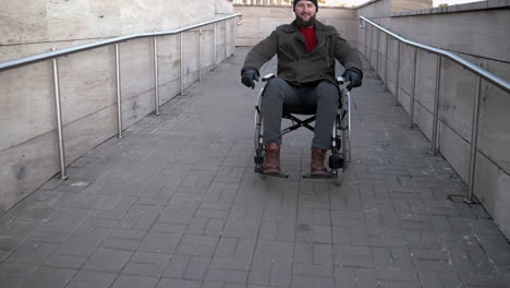 man in wheelchair on ramp