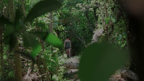 Woman-walking-in-a-forest