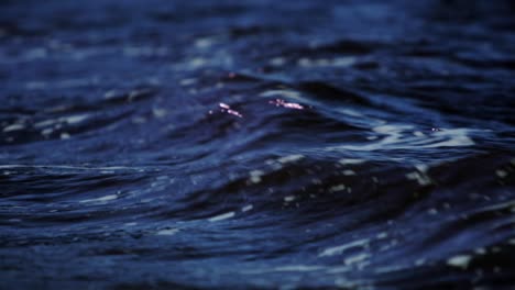 close up of small waves rolling