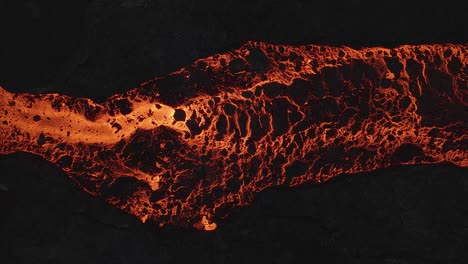 golden lava river texture abstract. aerial sideways