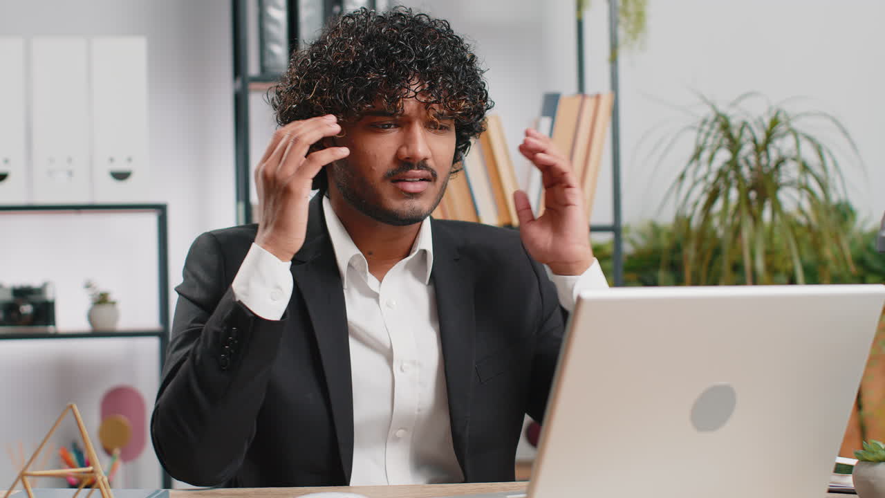 Indian businessman worried about financial problem stress money debt budget loss bankruptcy