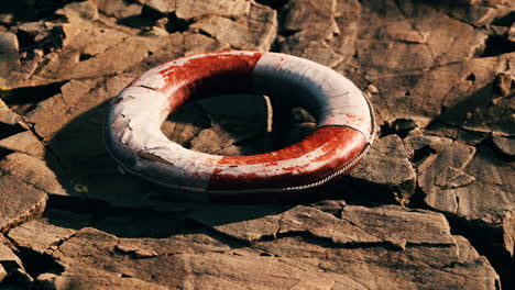 very old abandoned grungy lifebuoy