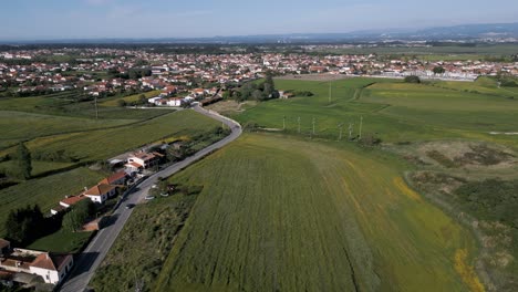 Pastoral-landscape-of-Murtosa-Village-with-fields,-Aveiro,-Portugal---aerial