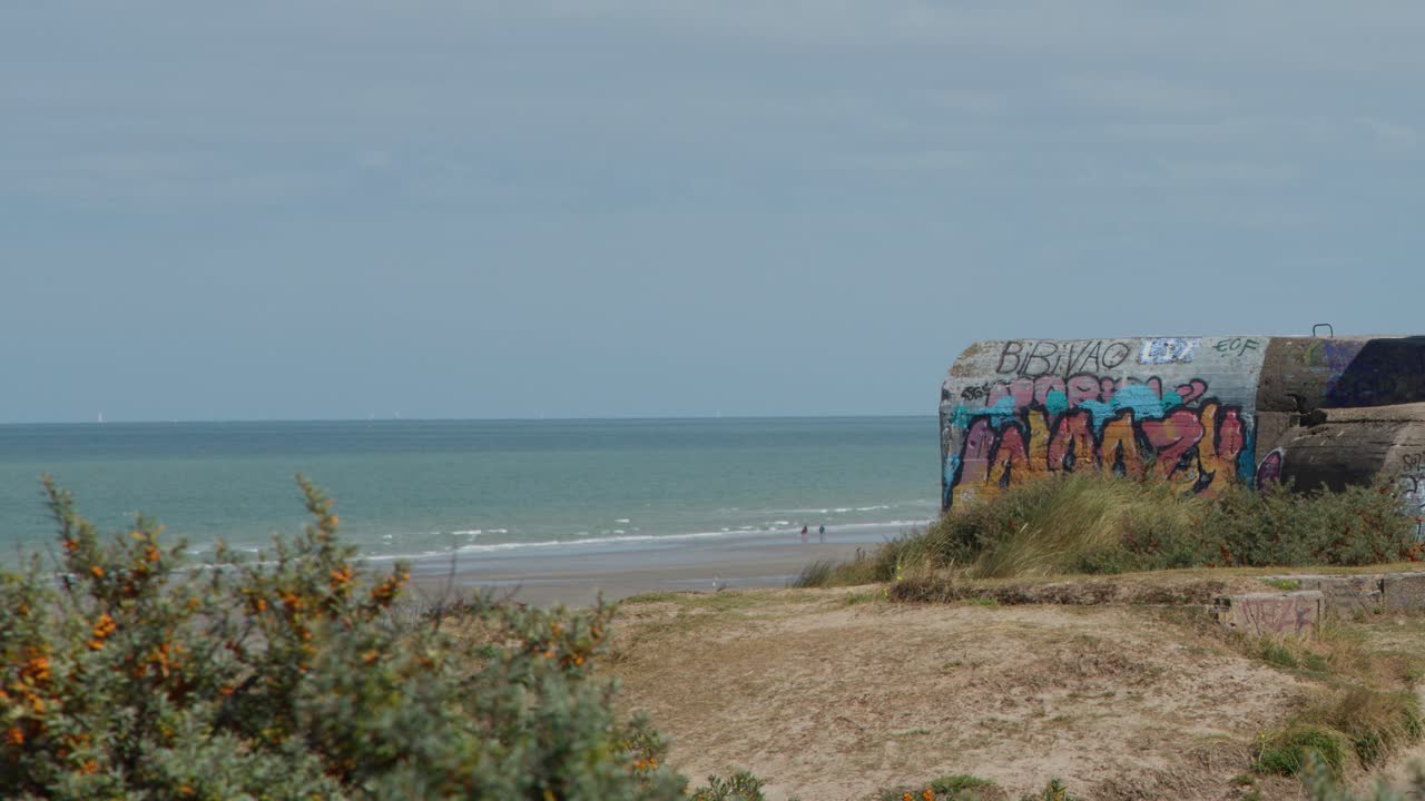 Beach bunker with graffiti art