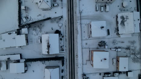 aerial top down view of lubawa city of poland after snow storm, winter white landscape urban cityscape