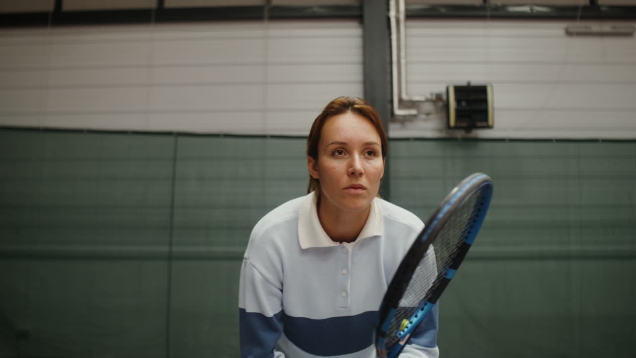 Woman Preparing to Play Tennis