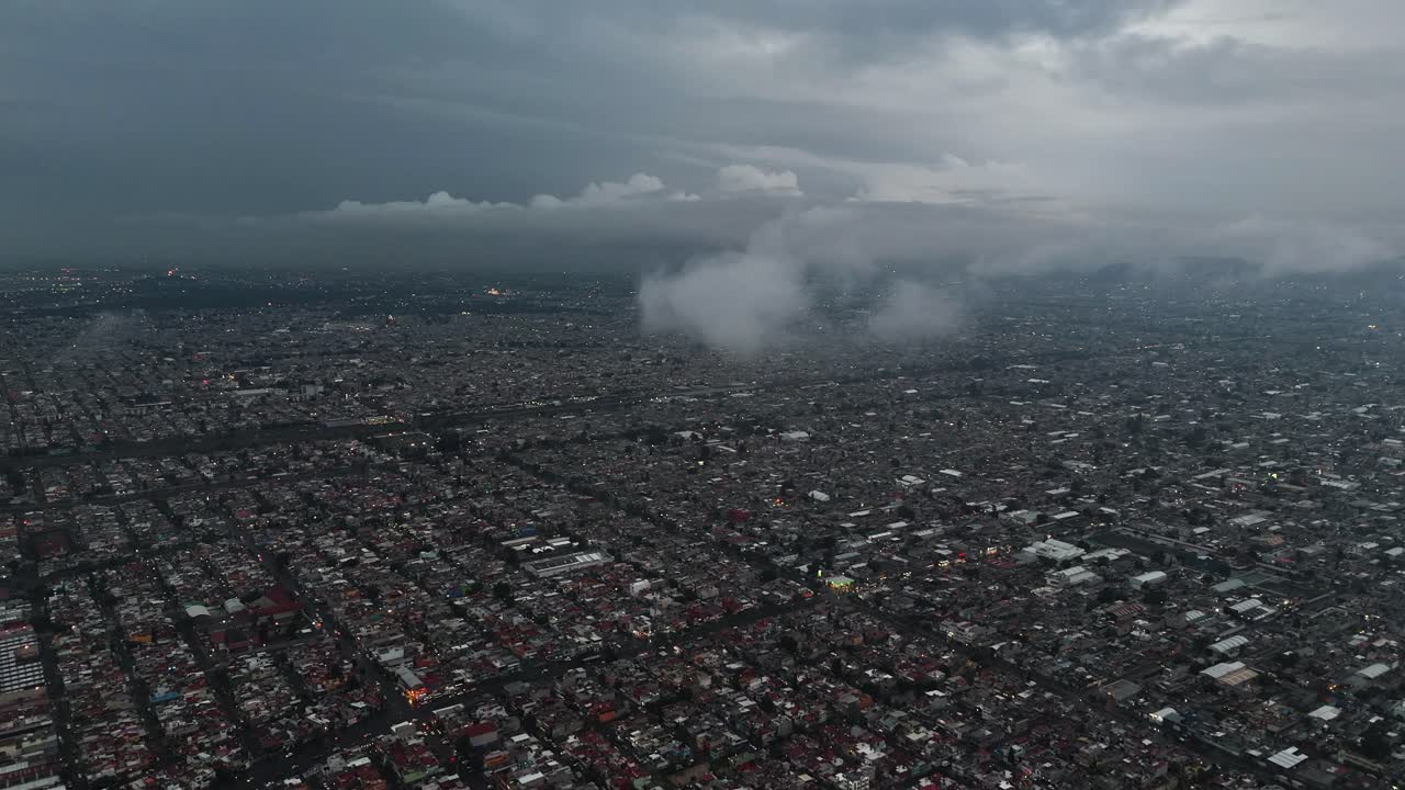 Rainy afternoon in Ecatepec with low clouds, captured by high-altitude drone